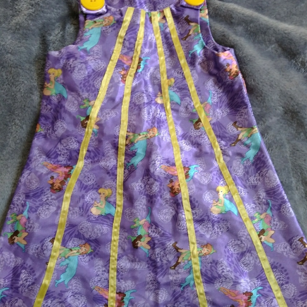 Shiny dress with button shoulder fairies